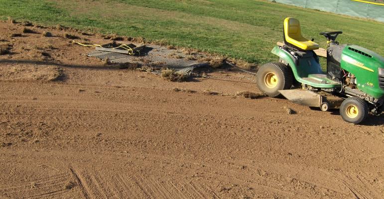 The weight on the screen drag helped break up the sod chunks.