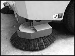 OPERATION SWEEPING 1. Raise the sweeper only high enough to clear the ground and drive slowly to the sweeping area.