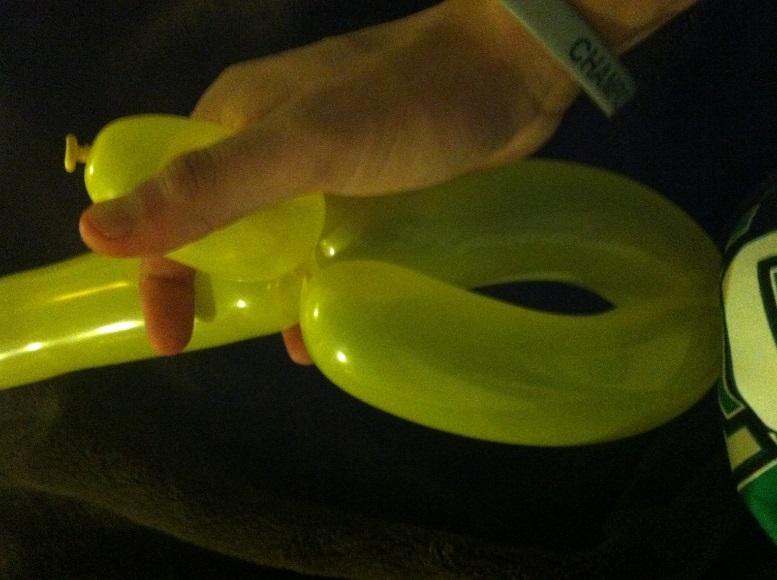 Step 6: Hold the top of the balloon and the 1 inch with your
