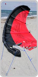 In the first image the rider has pulled down on the Waroo trim strap, effectively adding more depower to the kite.