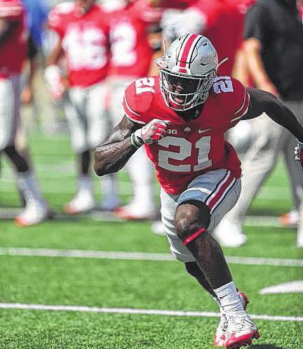 Ohio State running back Mike Weber (25) fights for yardage in the Buckeyes game at Oklahoma.