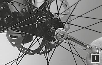 130920.PDF Wheel Installation 1. Wipe the spindle clean with a dry shop towel. Apply a highquality bike grease to I.D. of the bearings inside the hub.