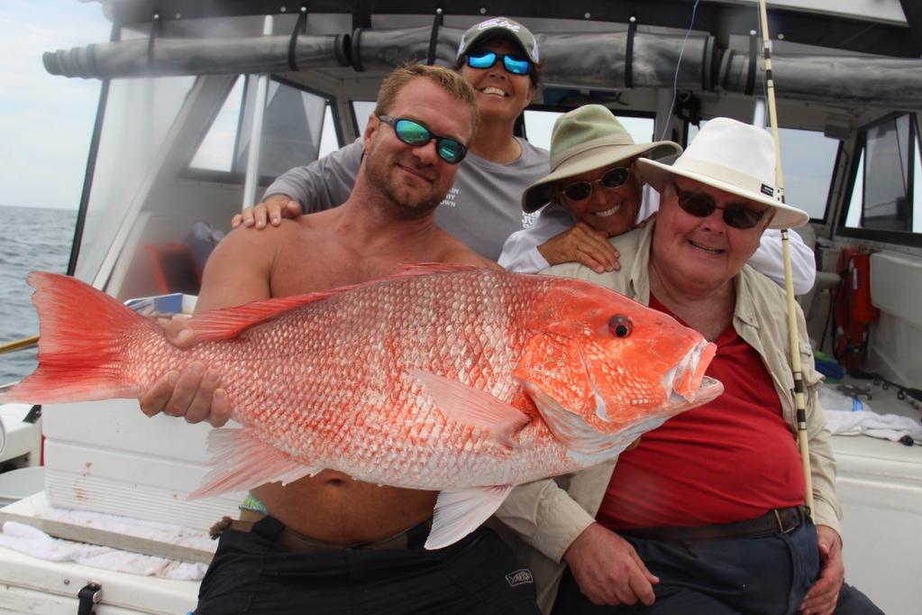 Who this? Captain Ryan Howard holding genuine red snapper Captain Steve Triple Trouble Howell, Captain Kathy Brown, and Captain Judy Helmey...all are part of Miss Judy Charters fishing team!