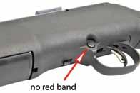 FIGURE 1 2. SAFETY OFF/READY TO FIRE Push the SAFETY BUTTON fully to the left exposing the red band (see FIGURE 2).