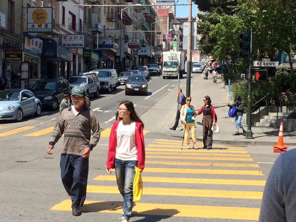 Pedestrians crossing during a don't walk phase at Kearny and Clay Image Credit: CCDC Urban Insitute Top pedestrian safety issues on Kearny are high vehicle speeds, unsafe turning movements
