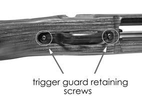 Using a 5/32 Allen wrench, loosen and remove the two screws securing the stock (see FIGURE 31).