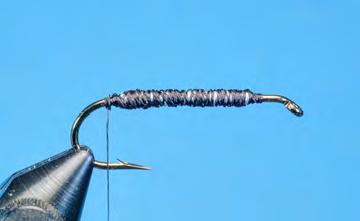 Woolly Bugger Streamer Hook: 3X-long streamer hook, #8 Thread: Black 6/0