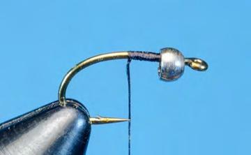 Zebra Midge Wet Fly Hook: Light wire curved hook, #14 Head: Brass bead,