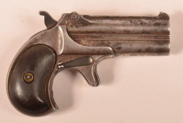 Page: 26 153 Remington Model 95 Double Derringer. Remington Model 95 Double Derringer..41 Rim fire Short Cal. 3"" round super-posed barrels, nickel finish, checkered walnut stock. No SN.