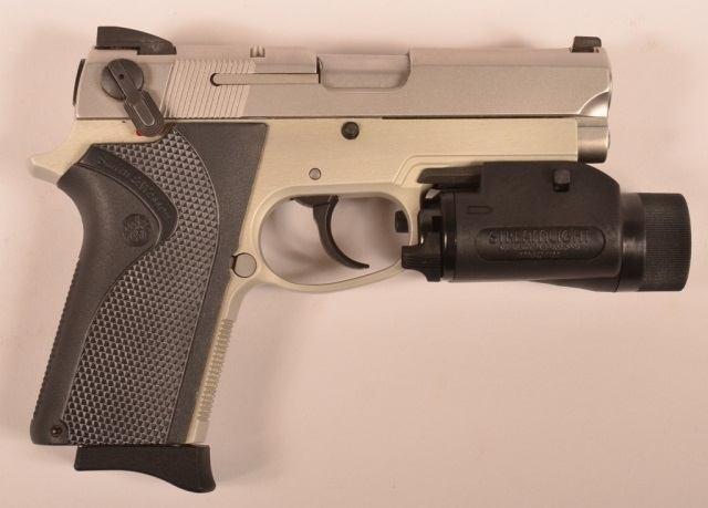 R - Intrac Arms International (TT-33 Poland) 7.62 x 25 mm Semi Auto Pistol. 4-3/8"" barrel, SN-DR09136. Condition: Very good. 40 R - S&W Model 29-3.44 Mag Cal. Revolver. R - Smith & Wesson Model 29-3.