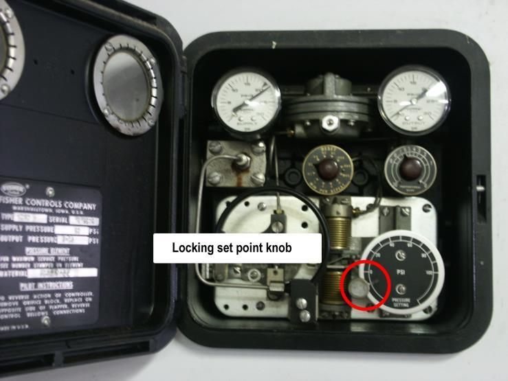 Steam pressure controller panel Open the rightmost control station by moving the lift latch on the right side of the cover.