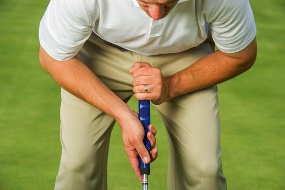 His other hand grips down the shaft, enabling that lower hand to swing the club around the stable point established by the upper gripping hand.