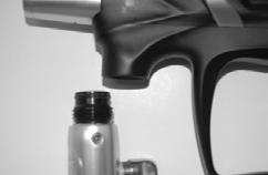 Tap the LPR body on a hard, flat surface to allow the LPR piston, spring, and spring follower to