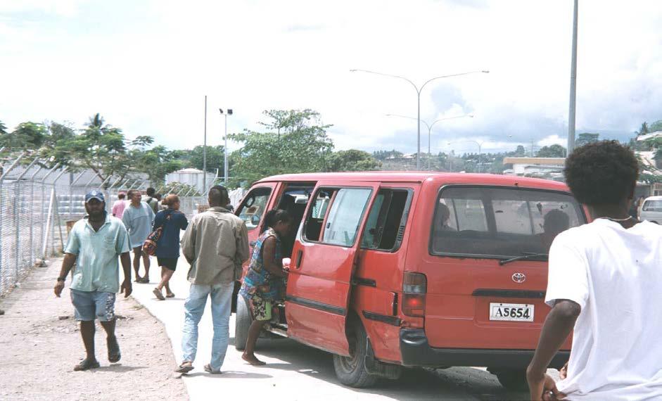 17.31. Much of the urban transport system is by privately-operated small buses. This scene is from Honiara in 2010.