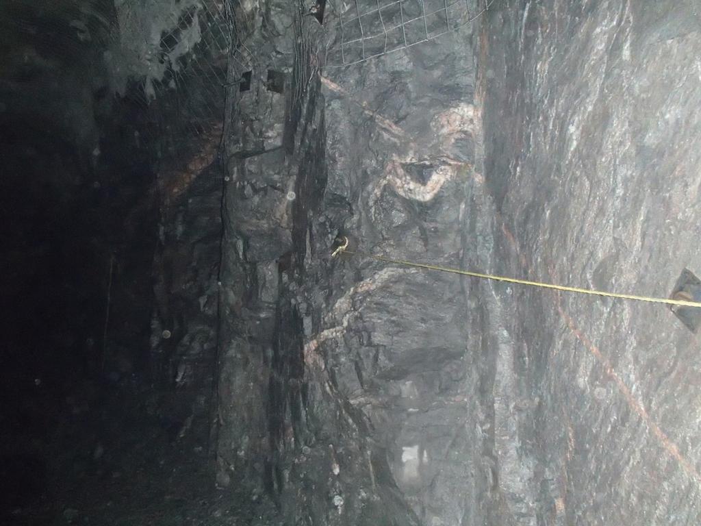 back, and it is reported that very little scaling is required. No major structures such as faults or shear zones have been intersected. Photos of typical conditions are shown in Figures 1 to 4.