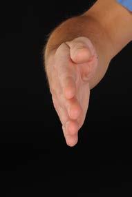 6. Start with your thumb positioned in your palm and in line with your index finger