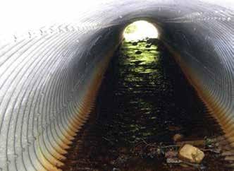 Stream substrate within the culvert was constructed to mimic natural stream conditions and withstand the forces of high flows.