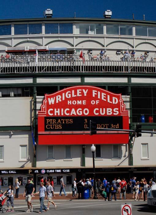 Wrigley Field is an old ballpark in Chicago. Teams played there over one hundred years ago.