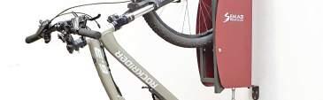 It includes an automatic mechanism to raise the bike upright with a minimal effort.