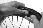 If necessary, use tyre levers to release one side of the tyre. Remove the inner tube. Use your nails to check the inside of the tyre for anything sharp.