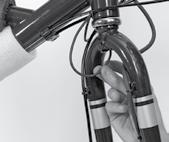 The headlight cable should exit through the bottom of the head tube (Figure D.3).