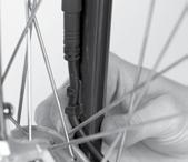 When installing the front fender: push the fender against the fork crown before bolting on the crown fender bracket.