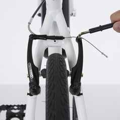 Unscrew the brake lever mount adjuster barrel and locking ring as far as possible without the adjuster barrel becoming detached from the