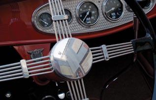 SO-CAL s banjo steering wheel is at home in this roadster.