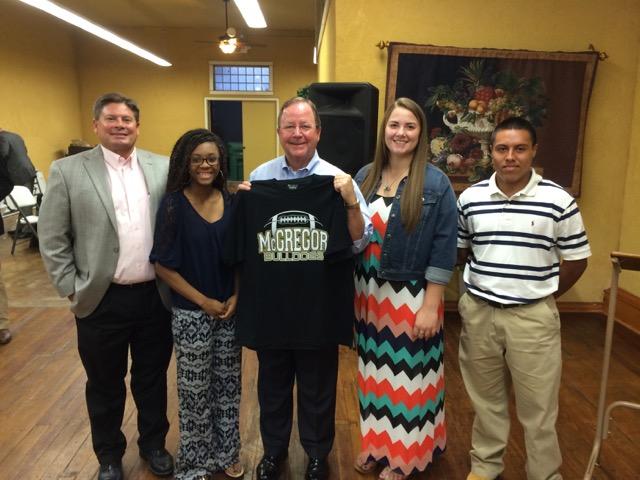 After the meeting, the students presented the Congressman with a McGregor Bulldog t-shirt and cap. Pictured at right are MISD Superintendent Kevin Houchin, Tori Thompson, Rep.