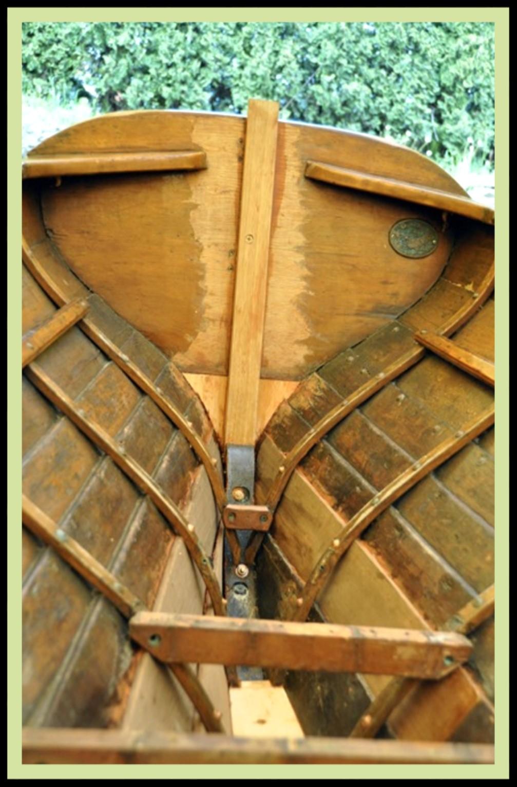 These repairs seem deceptively simple,... but they're not. Note replaced portions of transom, the entire transom knee, and portions of 3 planks.