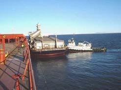 Export vessels are loaded at anchor from purpose-built self-unloading tug/barge units.