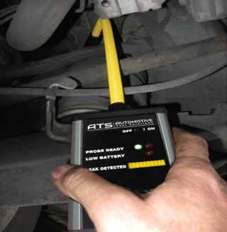Step 14.Take the electronic leak detector and go around the system to identify the leak site area.