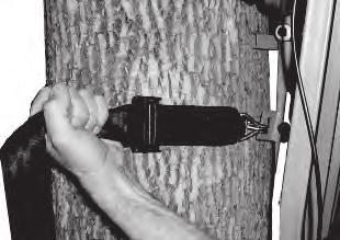FIGURE 2 MODEL: 51028/9207A Pro-Staff Hang-On STEP 2: With the treestand in the folded position, wrap Tree Strap around the tree once and hook
