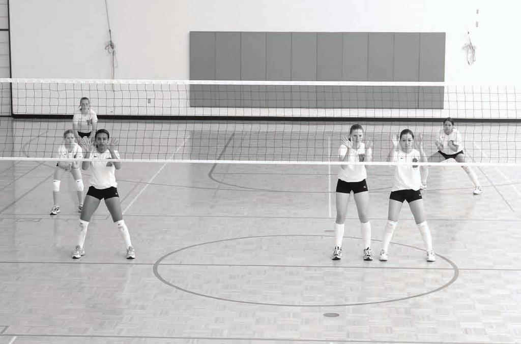 152 VOLLEYBALL SKILLS & DRILLS Figure 9.2 shows another example of a team in base position.