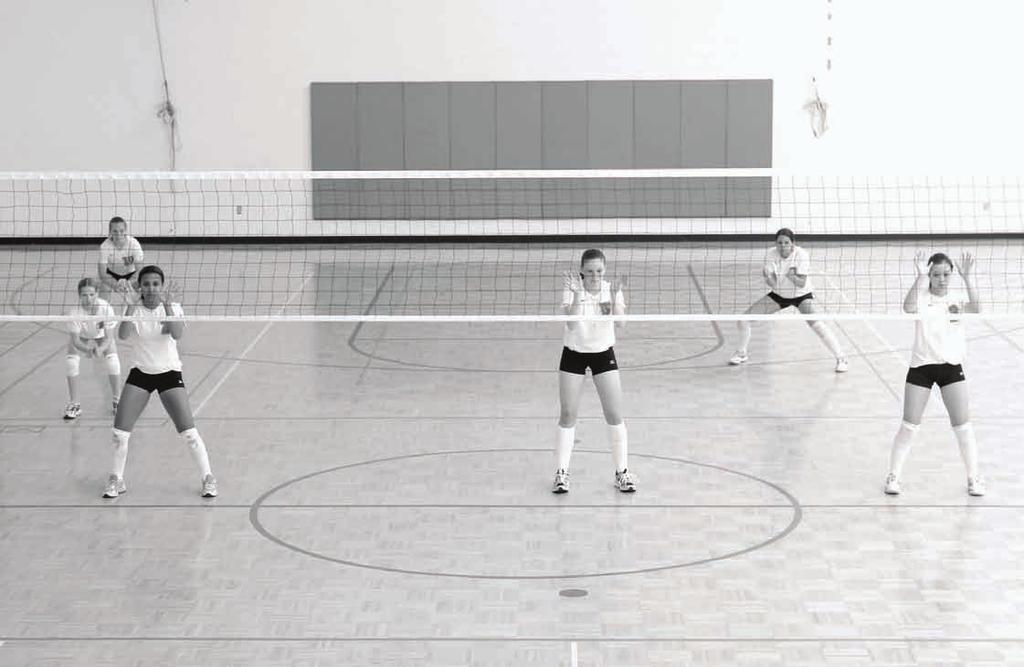 In this figure, the back row is positioned for rotation defense, and the left-front (LF) player is positioned to help the middle block the opposing middle hitter.