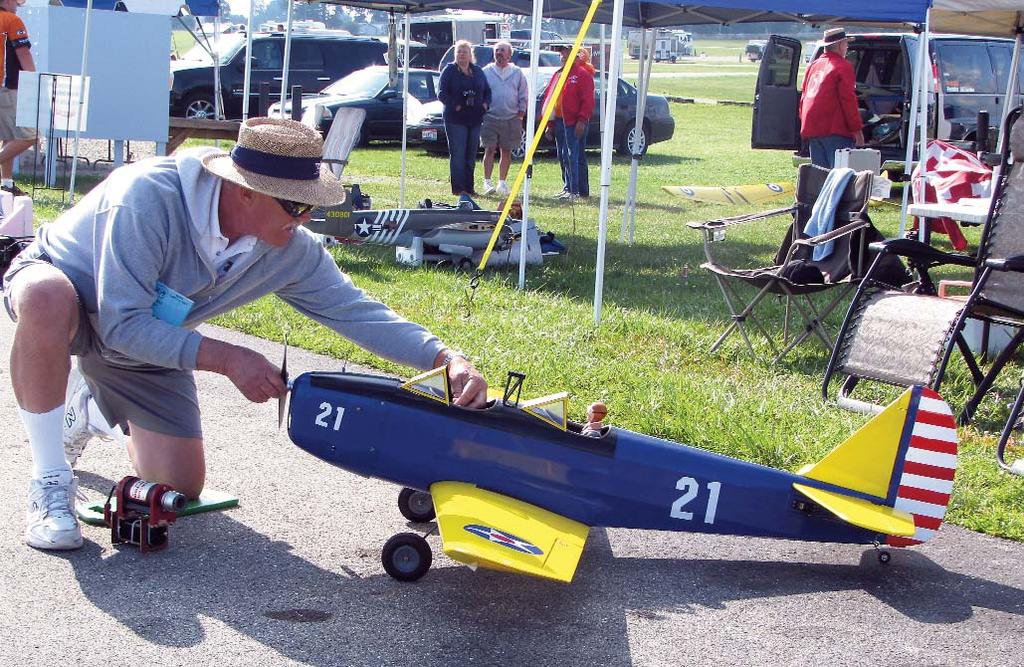Tom Poole prepares his Fairchild PT-19 for its next flight in Fun Scale. The Hangar 9 ARF is powered by a Saito 1.50 4 stroke. 3 Frank Noll s Macchi MB339 on his way to winning Fun Scale Open class.