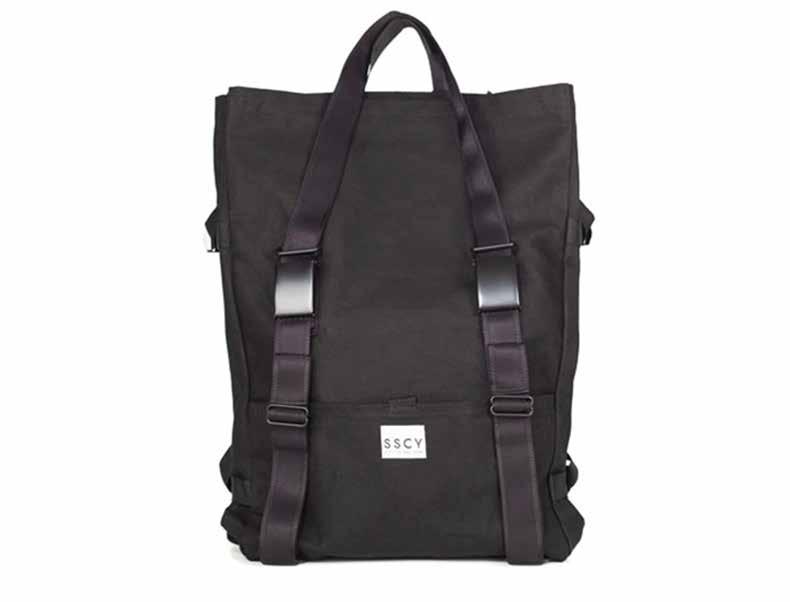 Tack Canvas Bag Black Navigate the concrete jungle with a bag that transforms from a backpack to a tote in seconds.