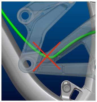 Must have a smooth radius from lower DT cable guide to Swingarm