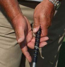 Photo 4 Proper right hand grip Several years ago, when I was at the Olympic Club in San Francisco, CA, to attend a required PGA Teaching seminar, one of the class leaders had brought his sixteen year