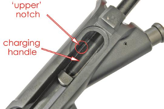 Grasp the face of the BOLT ASSEMBLY and pull it forward so that the CAM PIN is positioned as shown in FIGURE 39. FIGURE 39 7.
