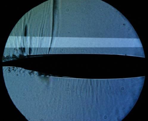 In fact, the -6 psig image shows barely visible shocks on the upper surface and no evidence of supersonic flow on the lower surface.