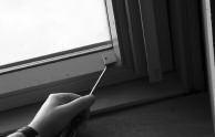 Prise out the grey tabs on the side of the window frame using a flat bladed screwdriver (found on a Velux window) or