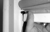 Mount a screw in both side channels in the bottom hole. NB: the screw should not be tightened. 2 3.