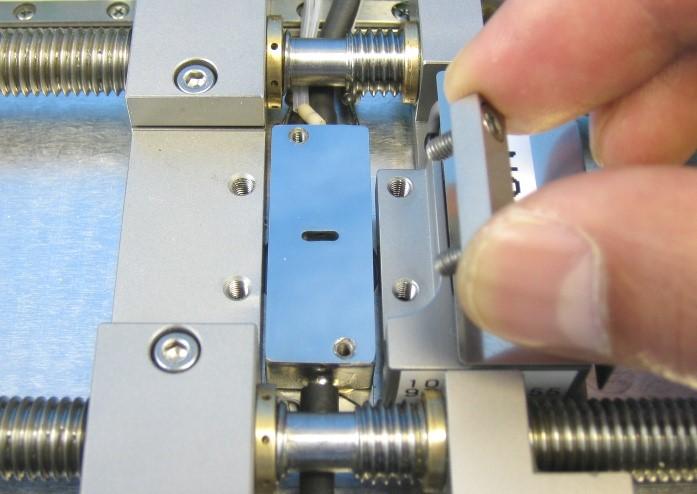Remove Clamping Jaws: Using the hex key supplied unscrew the 4x screws from the Clamping Jaws ().