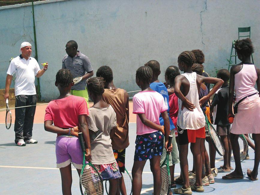 ITF DEVEL OPMENT TAKING TENNIS TO THE WORLD While developing tennis around the world is their mission, improving the lives of kids and