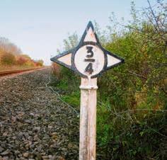 13 Mileposts are positioned alongside the railway usually