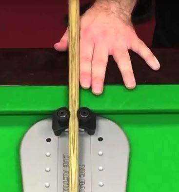 The cue glides along the first finger, the thumb being to stop the cue falling away from the finger.