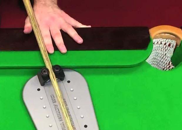Then pull the cue out of the legs and back to the V of the bridge hand.