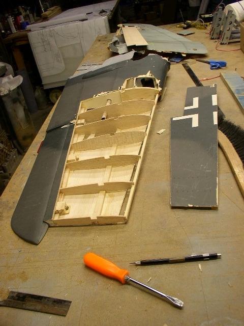 Top side view of right wing panel. The right panel now has the new ribs installed along the lower spar.