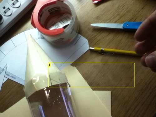 tape to one side of the fin Part C: Align the edge of the fin with the bottle and set